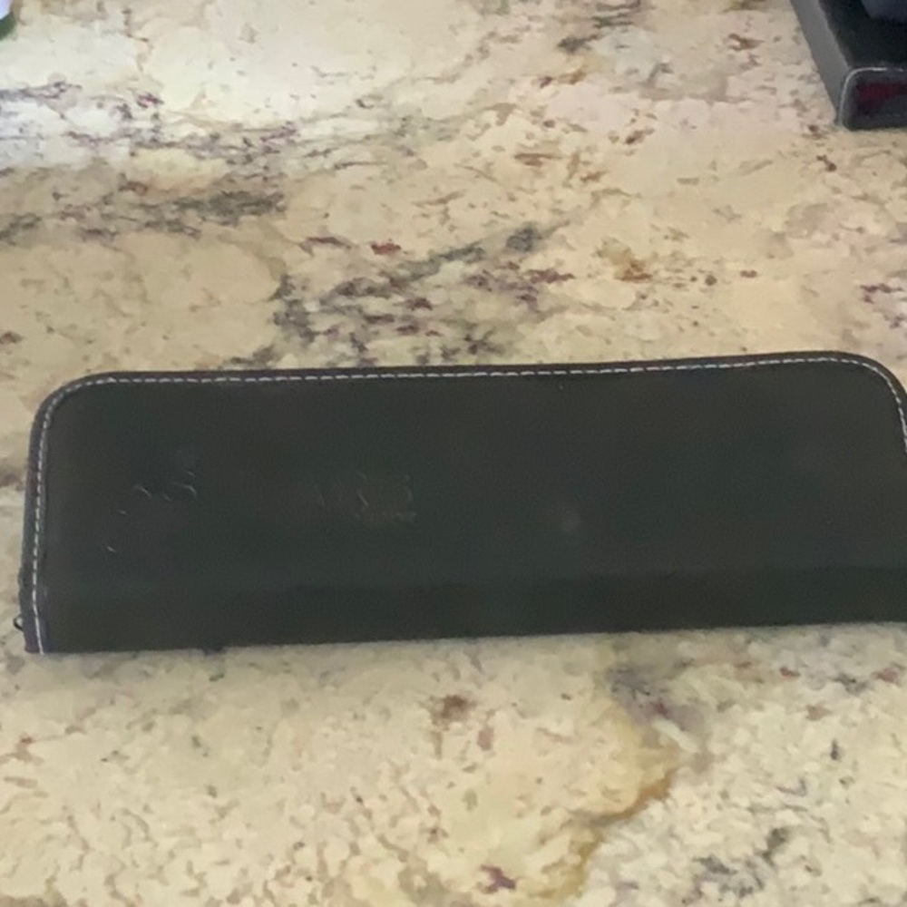 Black scissor holder. Never used zippered